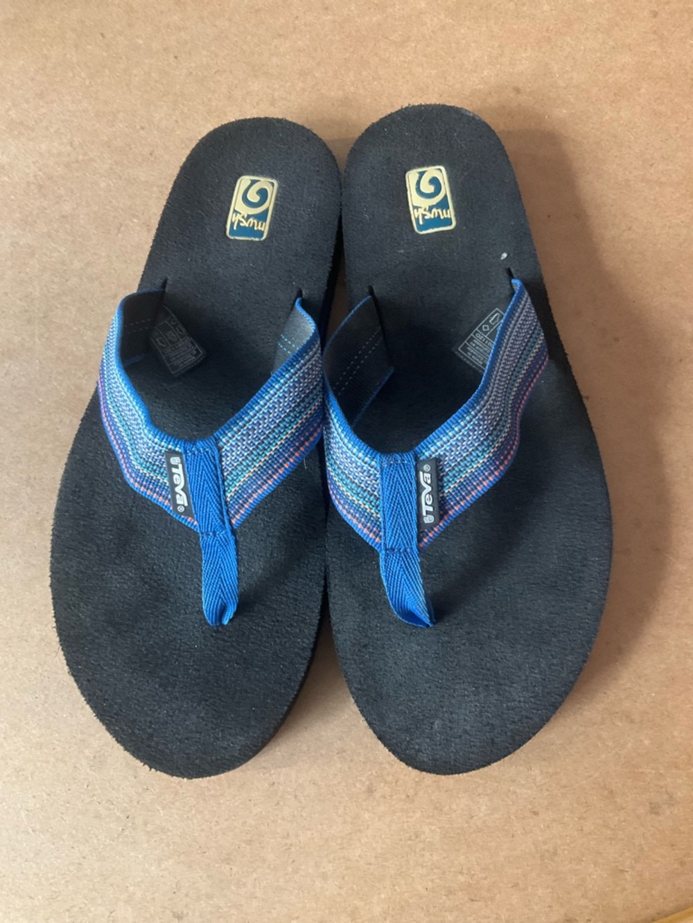 Teva Blue and Multicolor Woven Strap Black Footbed Sandals